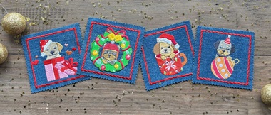 Denim coasters with festive dog embroidery patterns on wood background