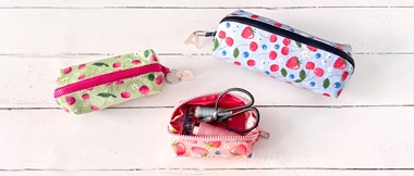 Three fruit themed pencil cases