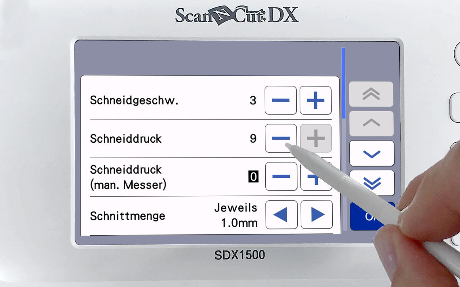 hand with stylus changing cutting pressure on Brother ScanNCut screen