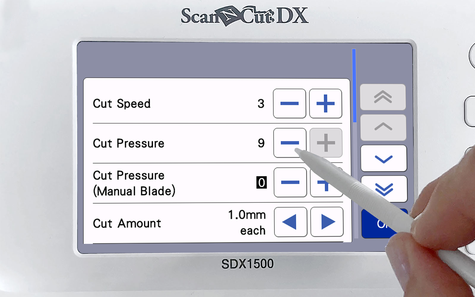 hand with stylus changing cutting pressure on Brother ScanNCut screen