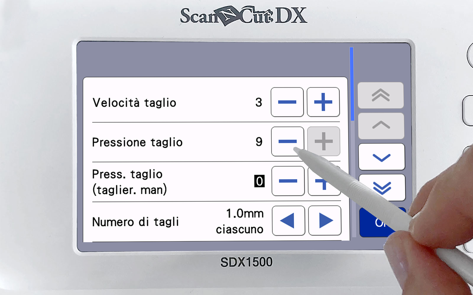 hand with stylus changing cutting pressure on Brother ScanNCut screen