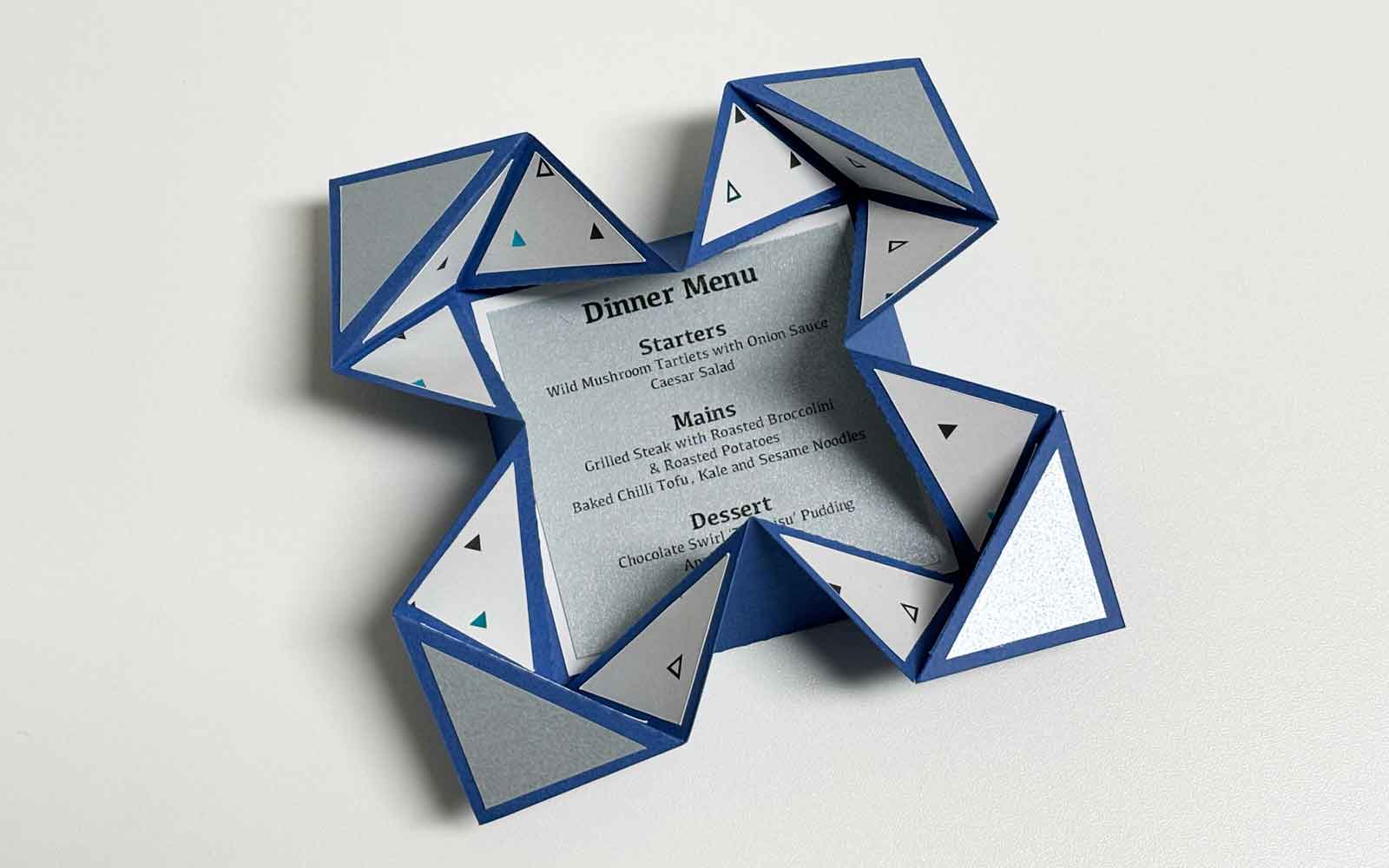  Printed menu in blue napkin fold card