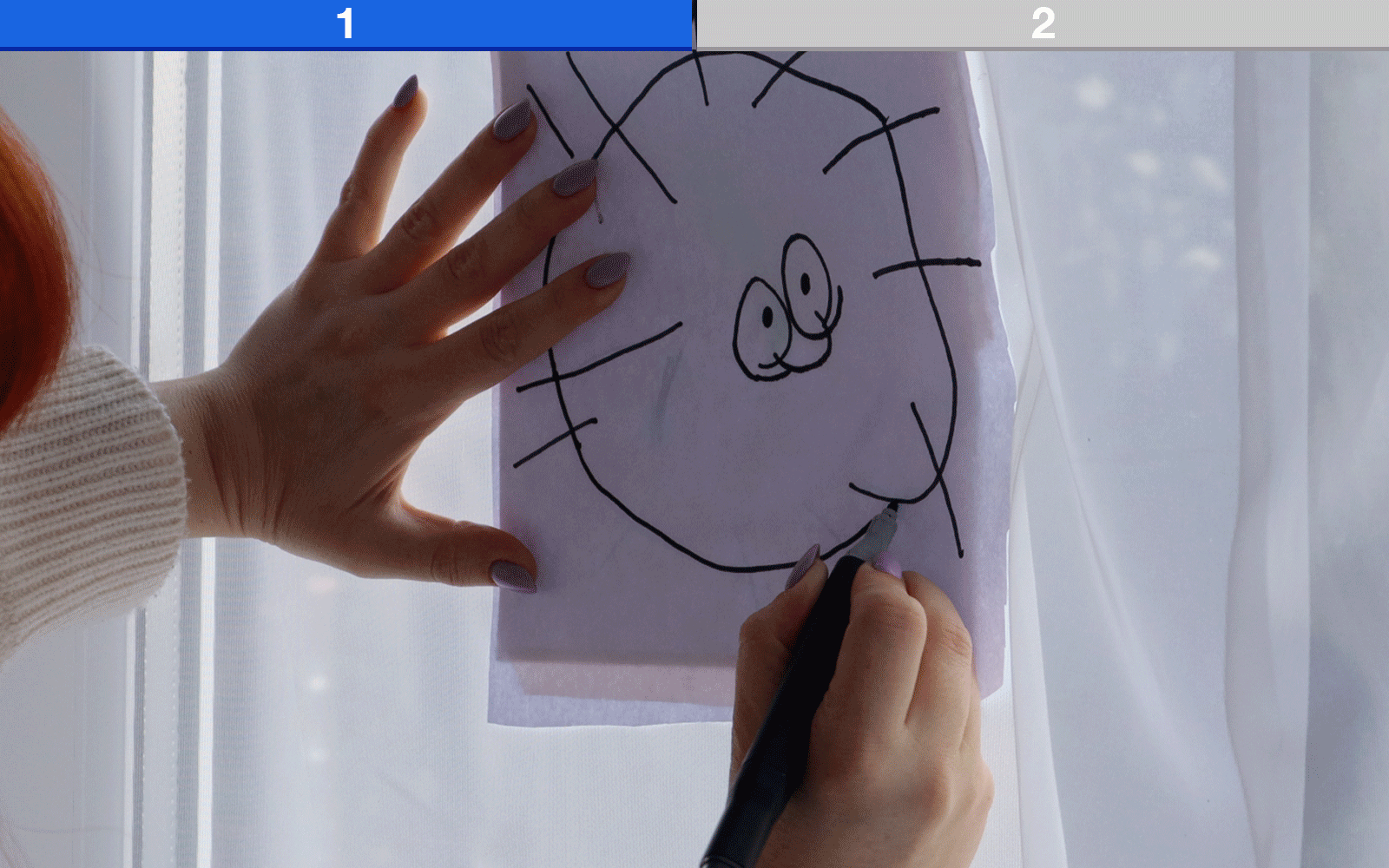Dessins d'enfants devant la fenêtre et le ScanNCut de Brother 
