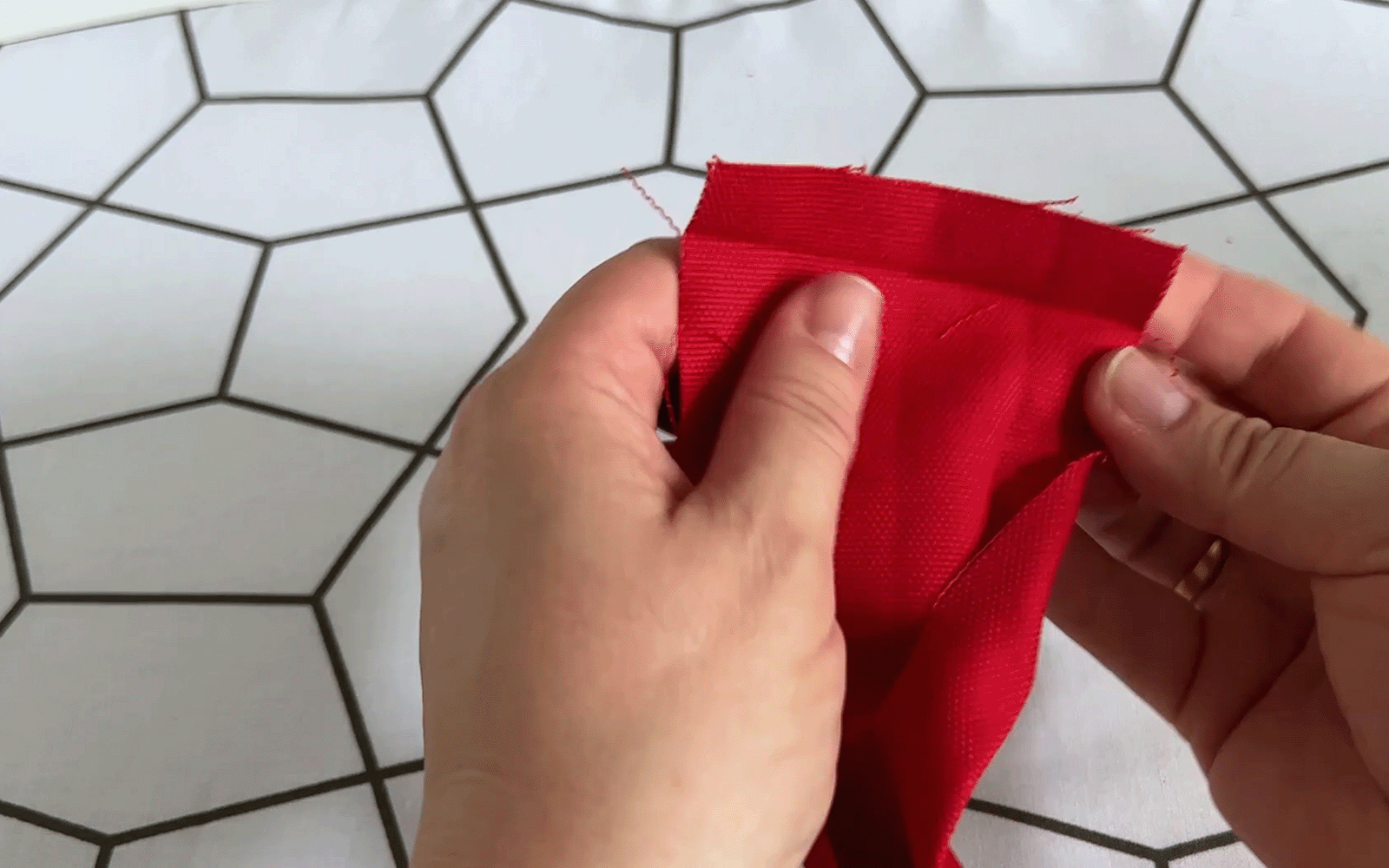 Folded red fabric strap
