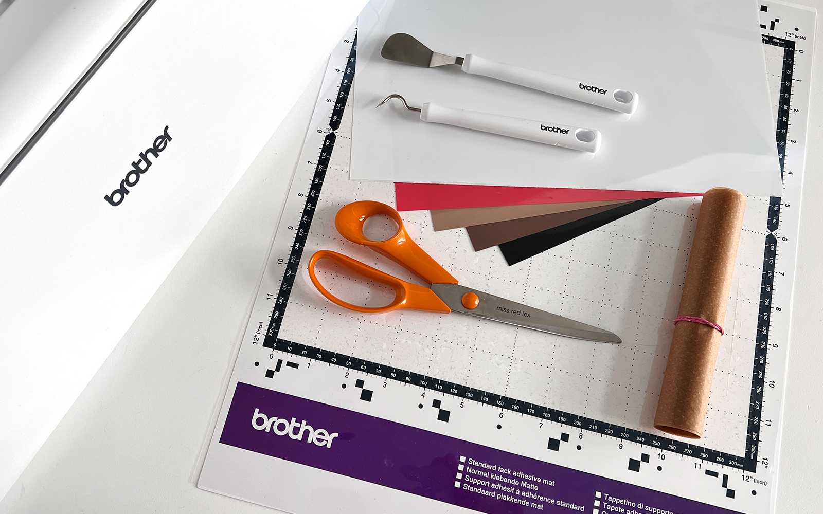 Different coloured vinyls and cutting tools