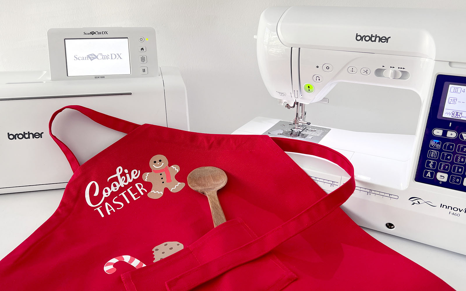 Red apron in front of sewing and ScanNCut machine
