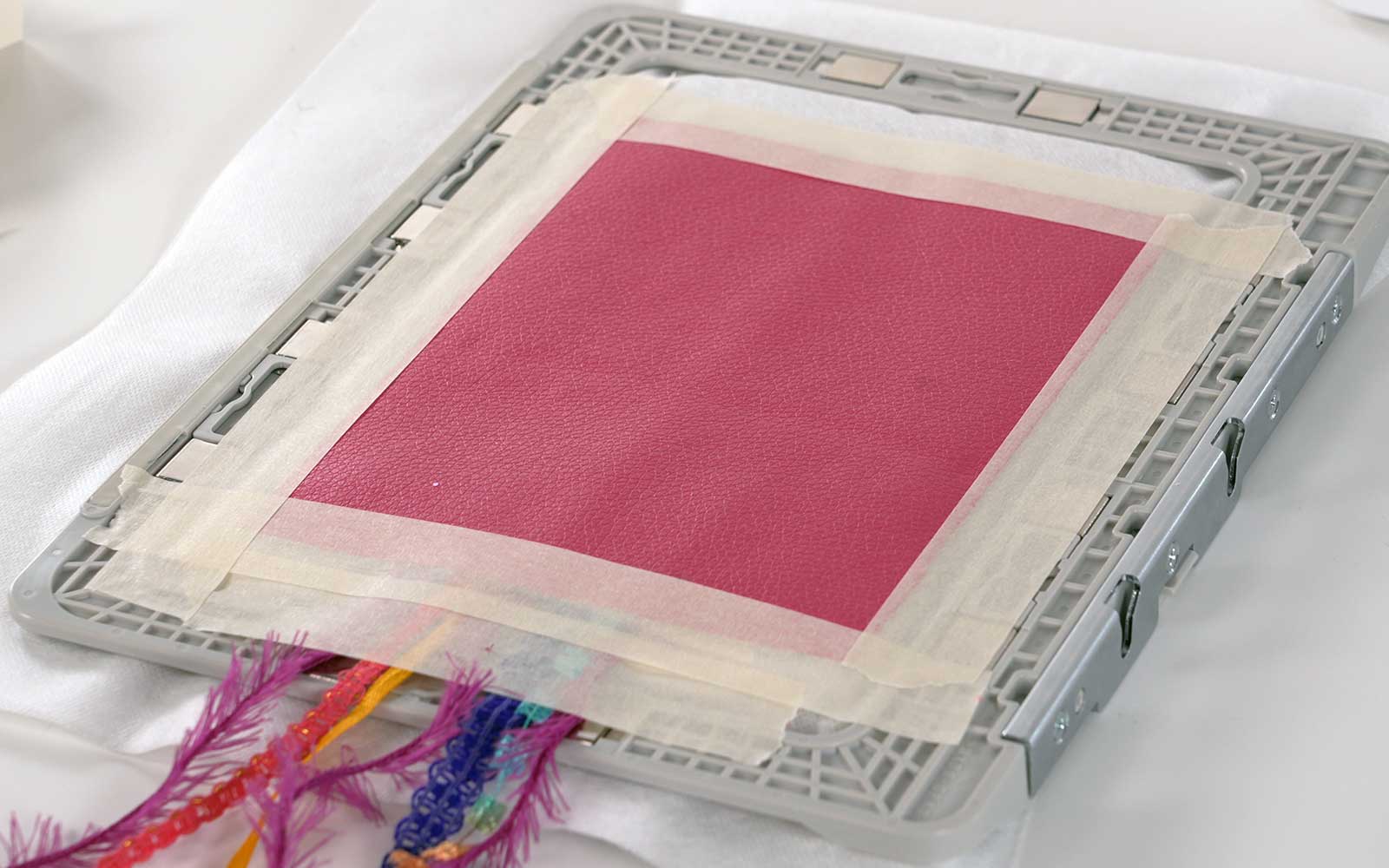 Back of Brother magnetic embroidery frame with pink vinyl