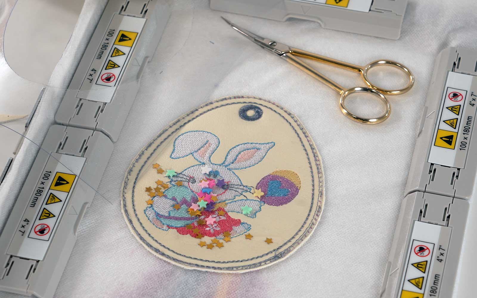 Light yellow Easter egg and bunny embroidery in Brother magnetic frame 