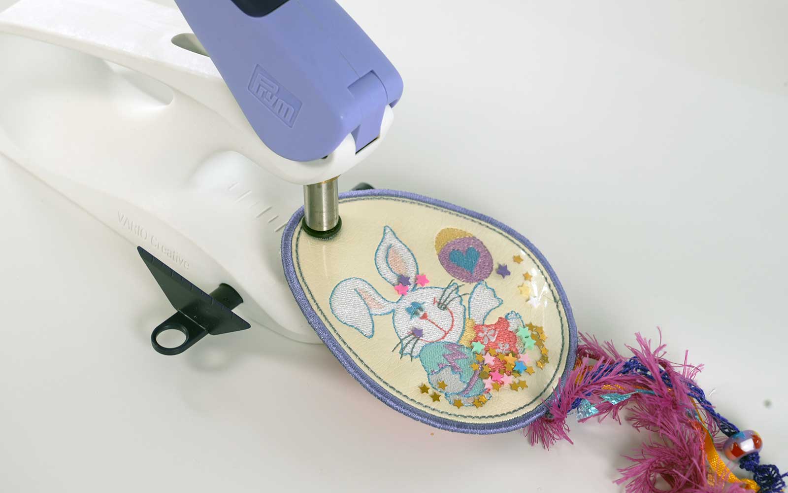 Prym hole punch with Easter bunny embroidered bag tag