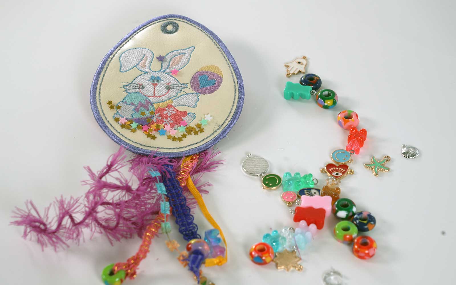 Beads and charms to add to egg shaped bag tag.