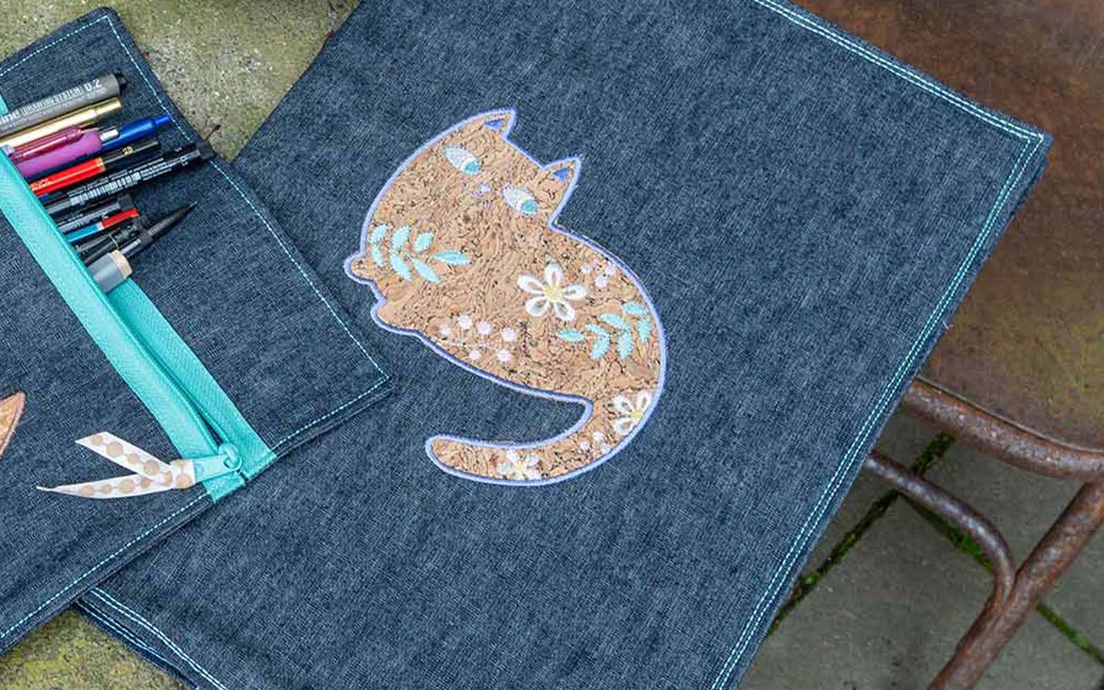 cartoon cat appliqué on book cover