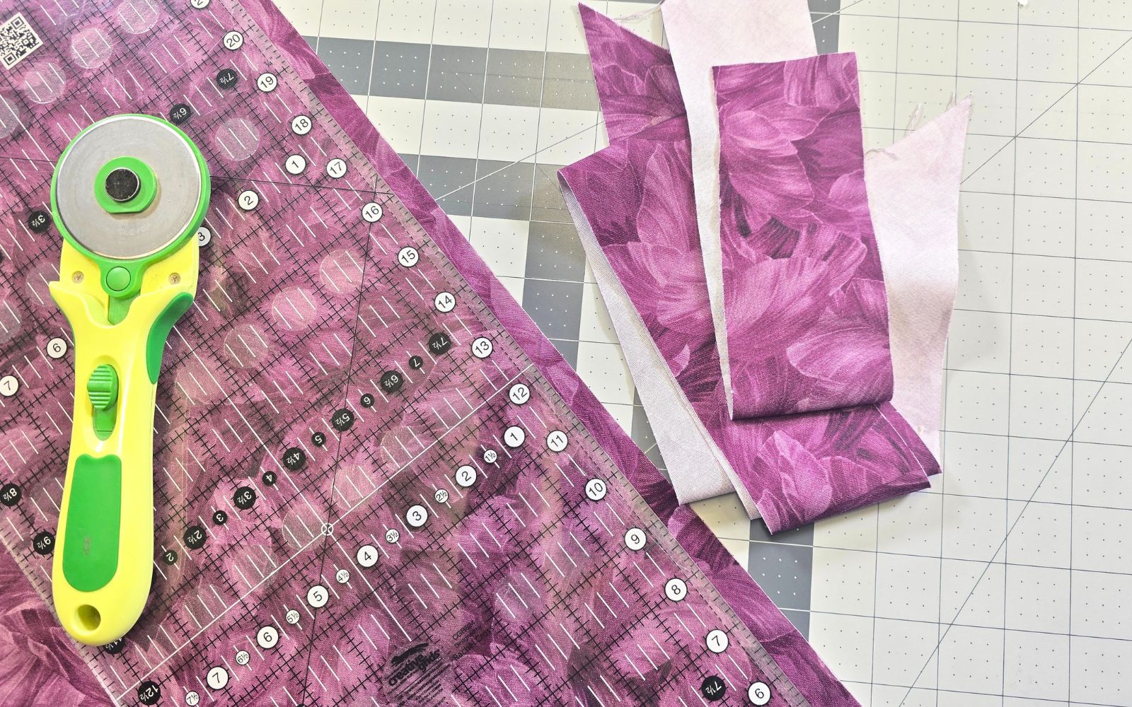 purple bias binding on cutting mat