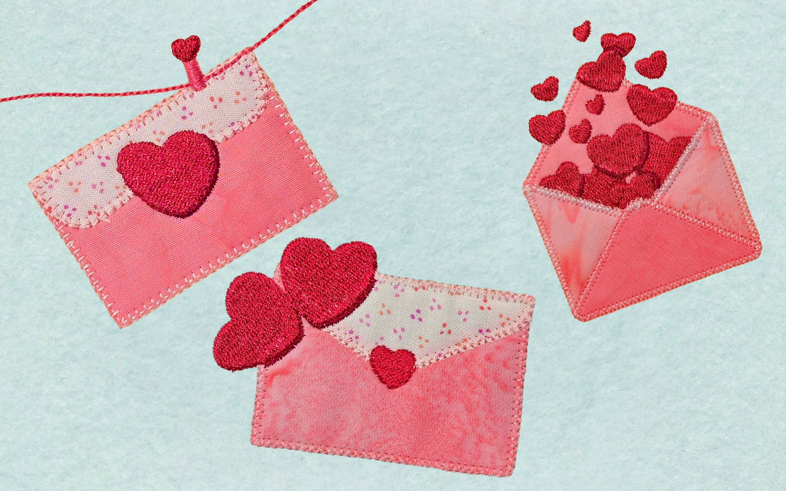  3 enveloppes de Saint-Valentin avec une broderie et de l'appliqué en rose