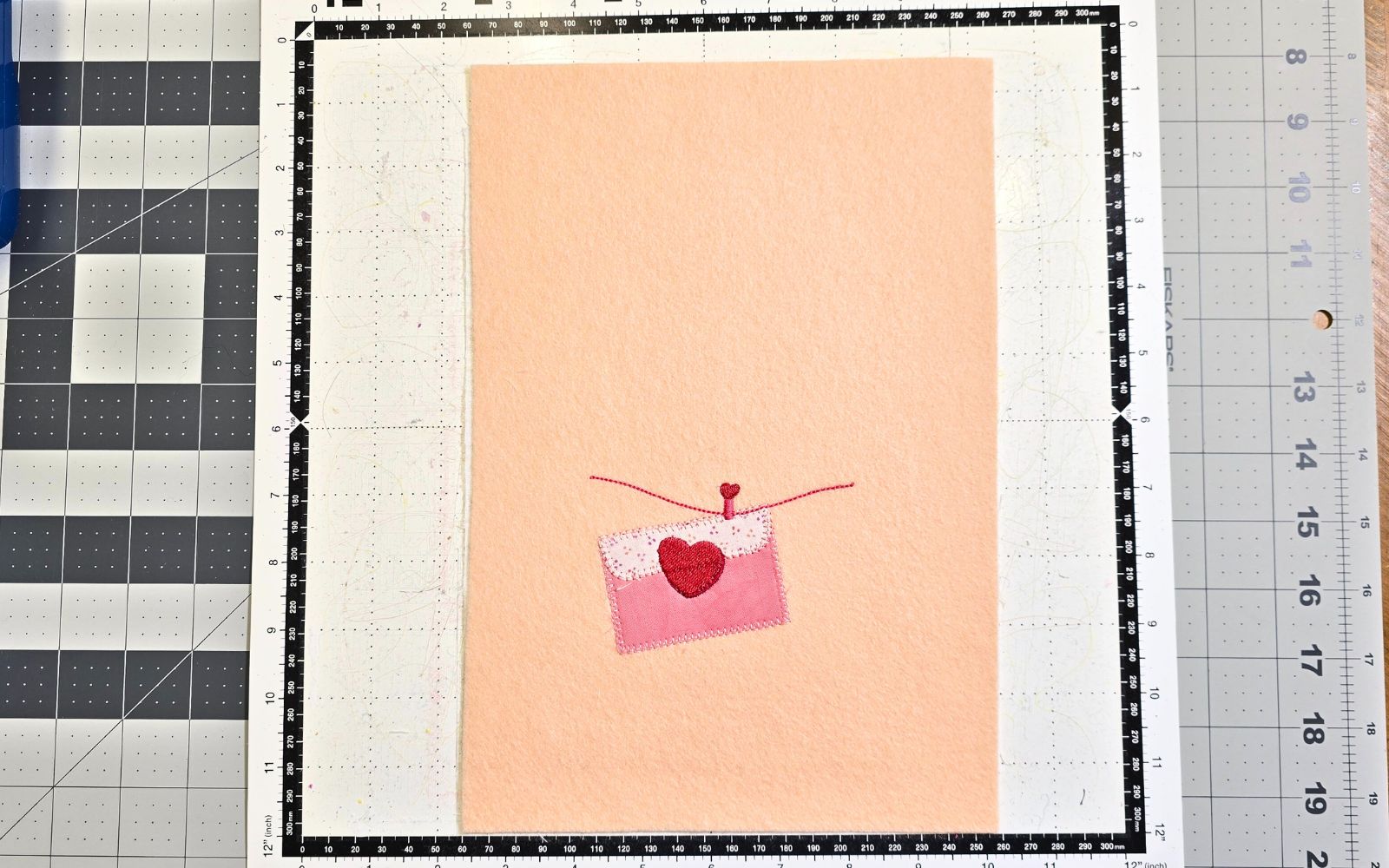 embroidered peach felt on Brother ScanNCut cutting mat