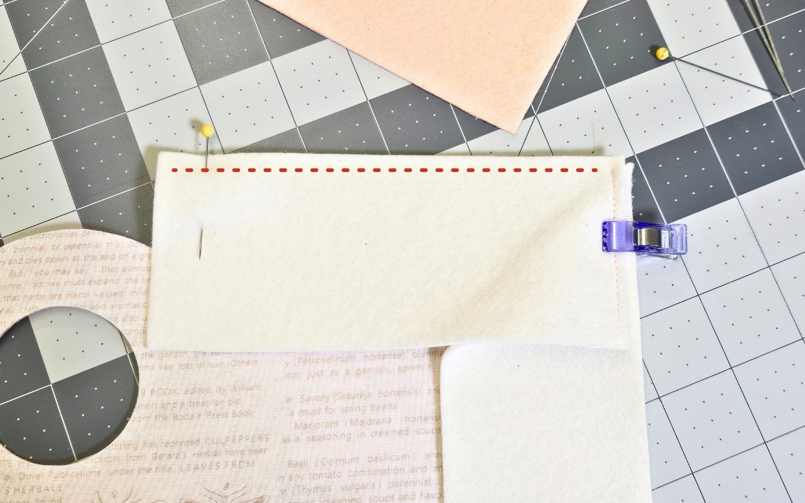 Printed and felt strips on grey background