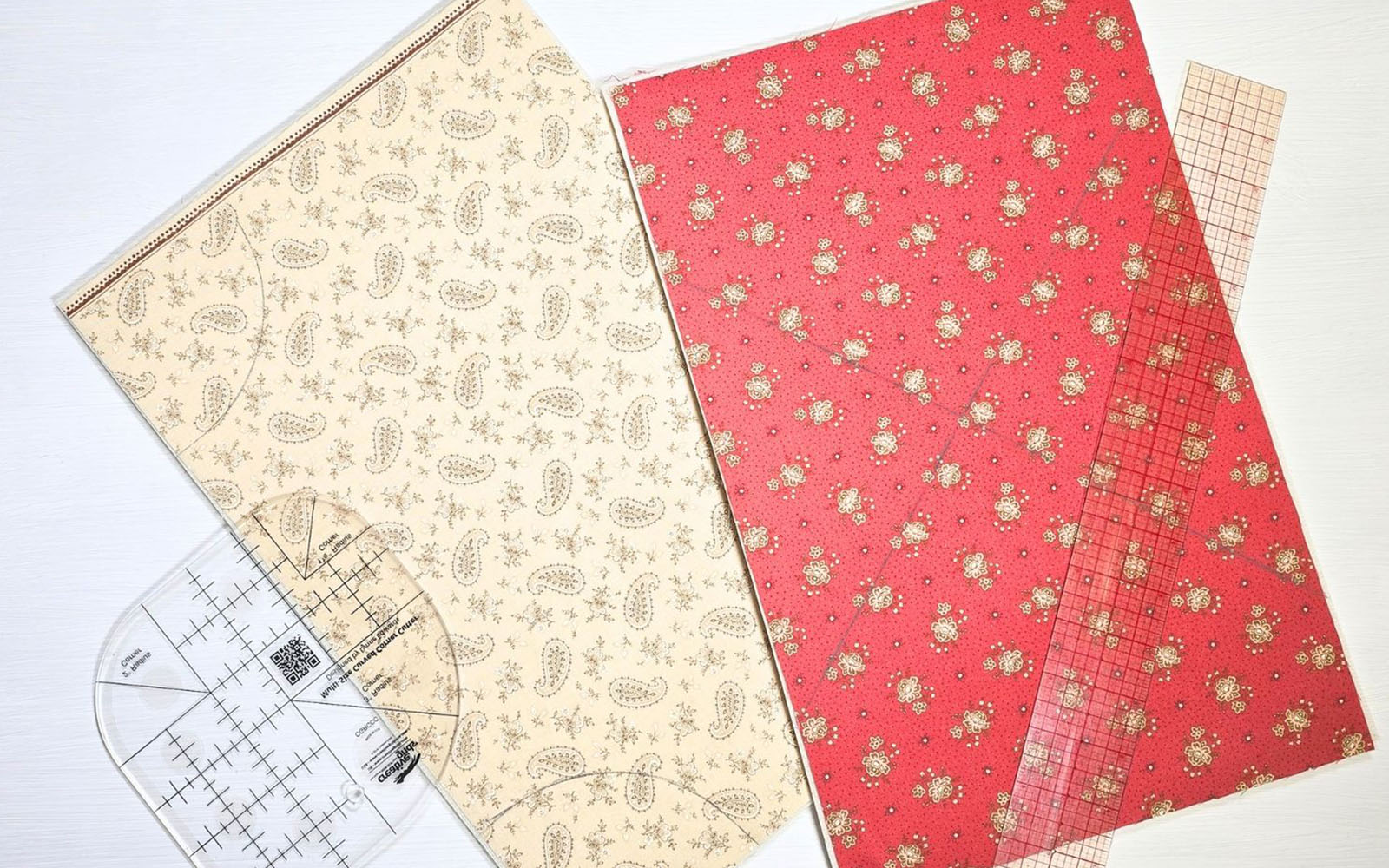 Yellow and red fabric with quilting lines drawn on