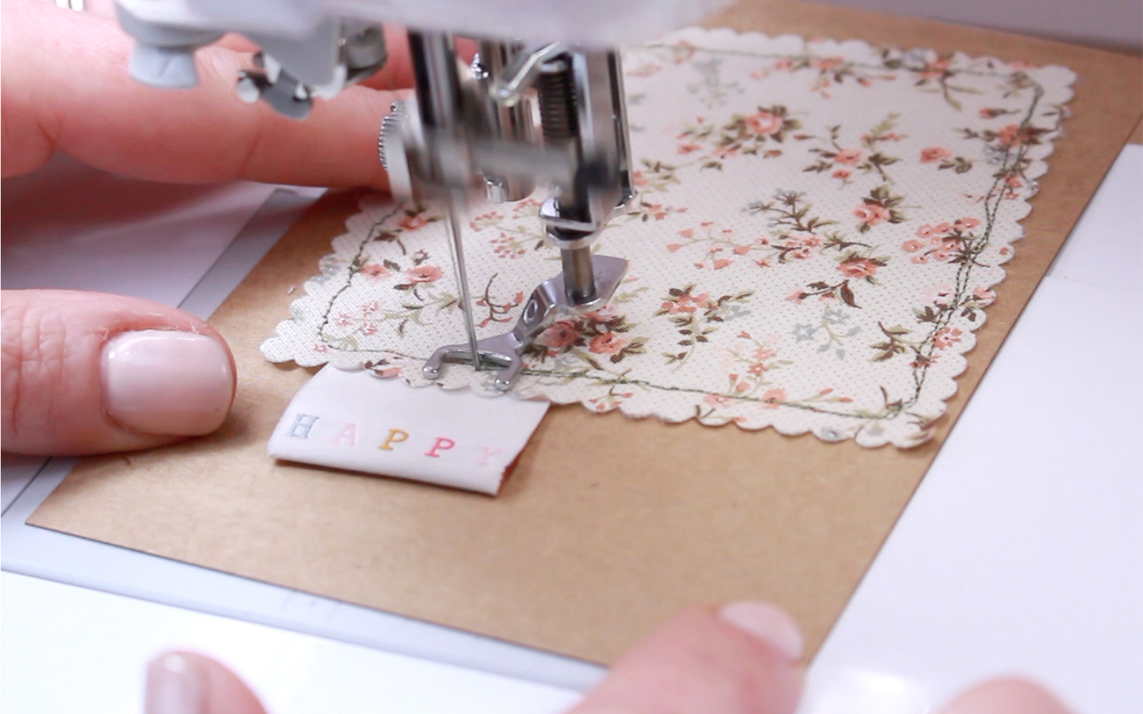 Brother sewing machine free motion sewing around fabric shape on card 