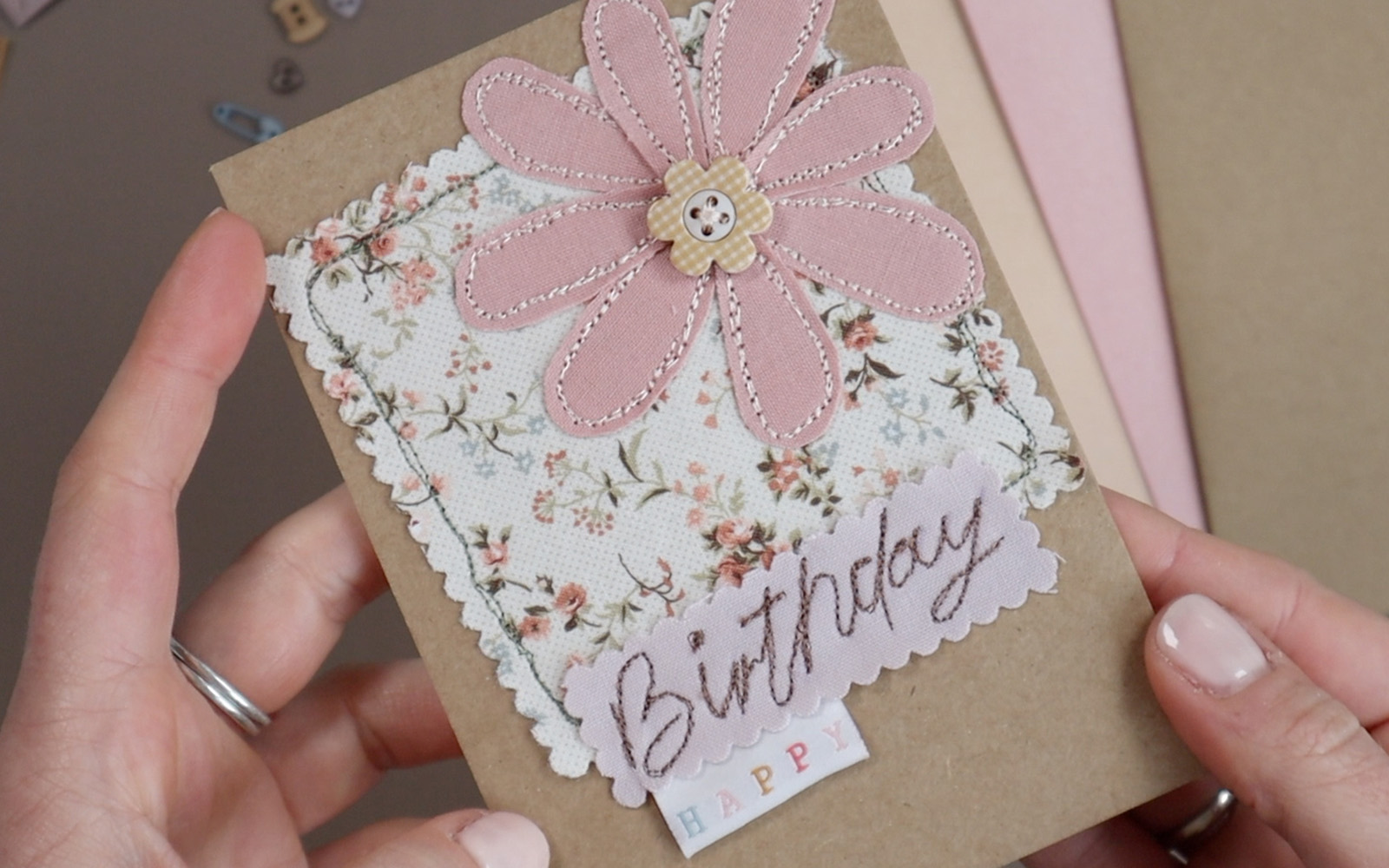 Free motion appliqué and embroidery card made on Brother Stellaire 
