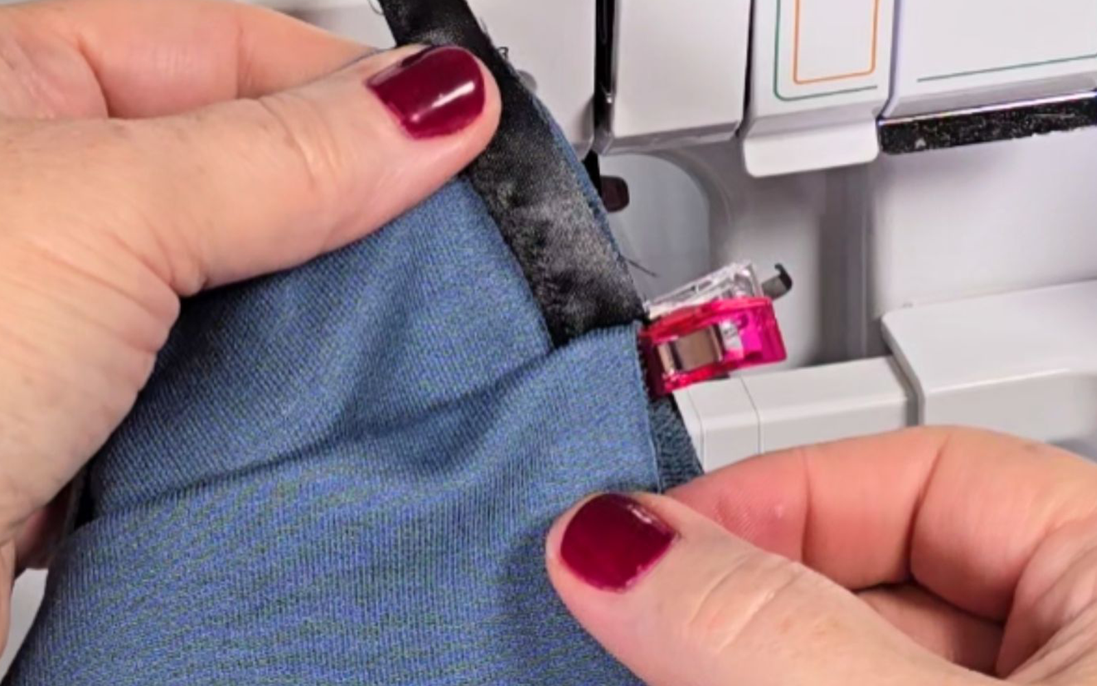 Piping clipped between two layers of fabric.