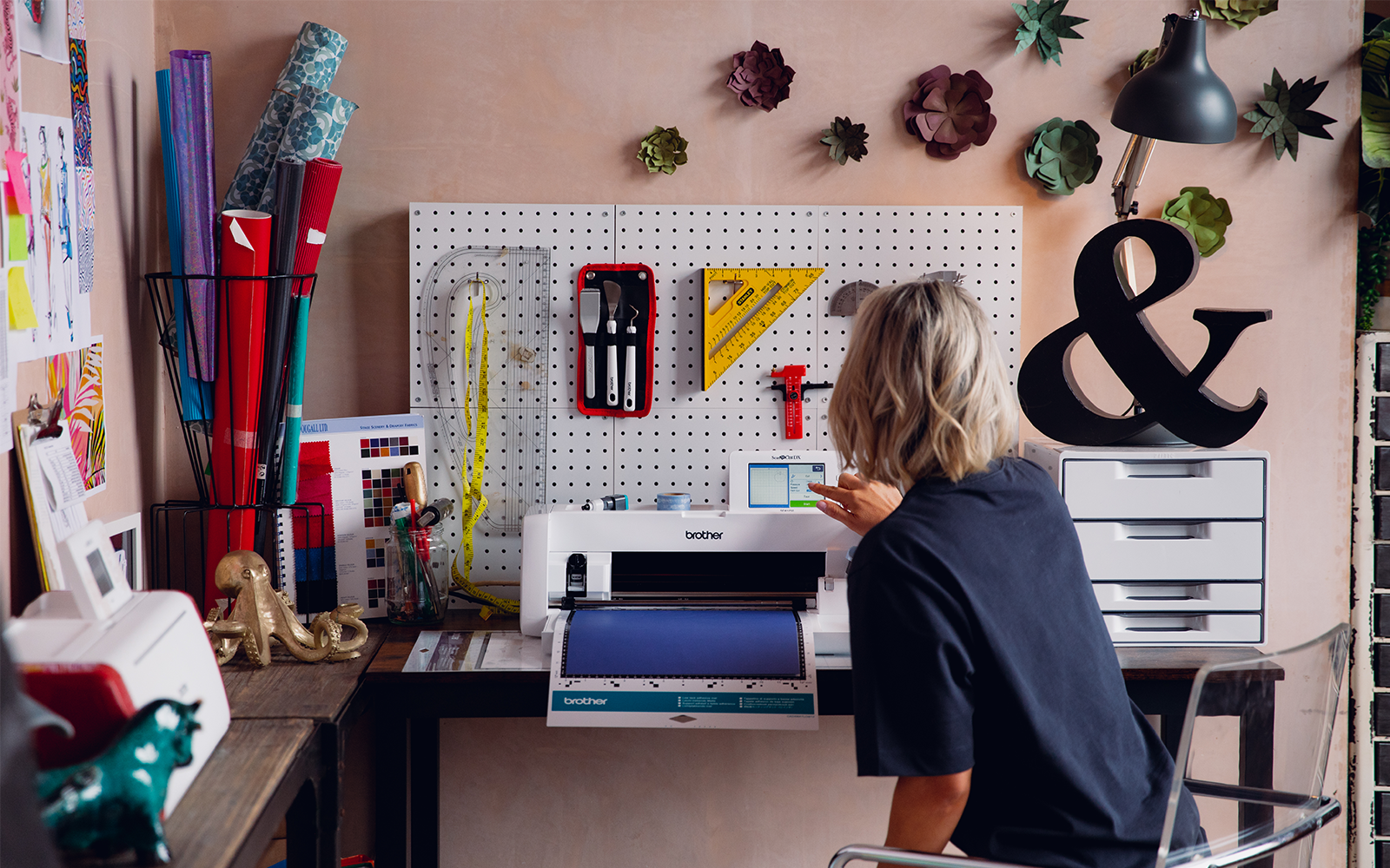 women working on Brother ScanNCut in craft room