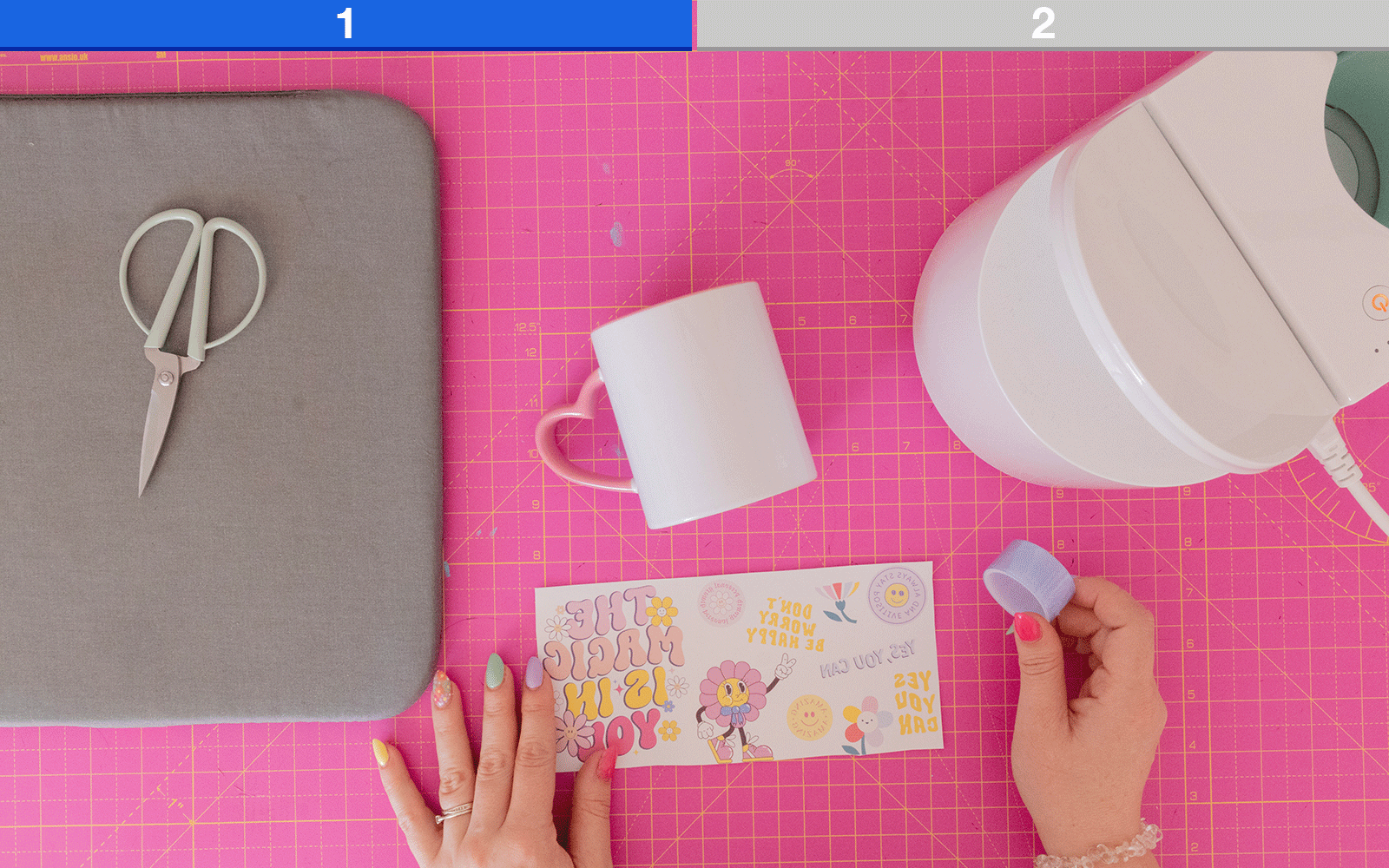 Hands preparing SP1 sublimation print for mug