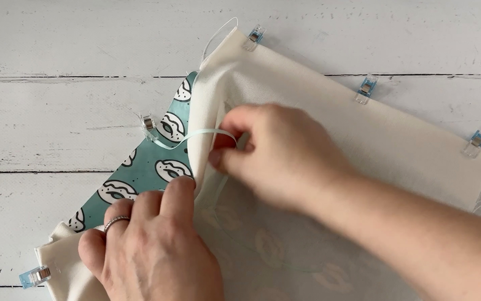 clipping ribbon to printed fabric book cover