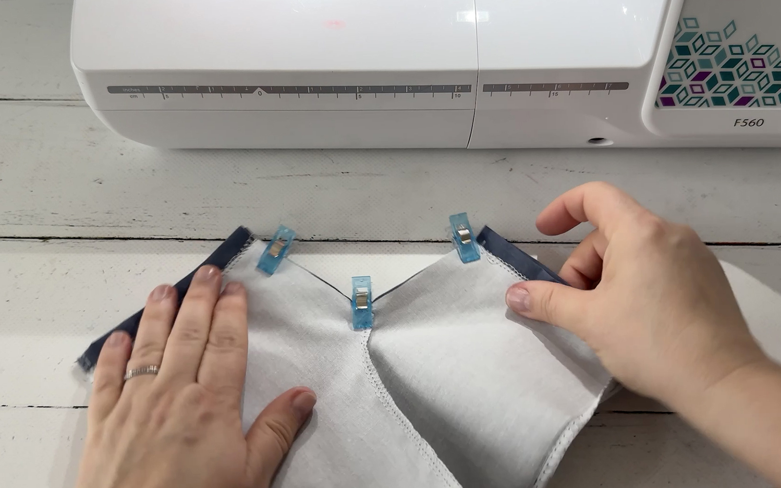 Sewing inside leg seams of doll’s pants on Brother sewing machine