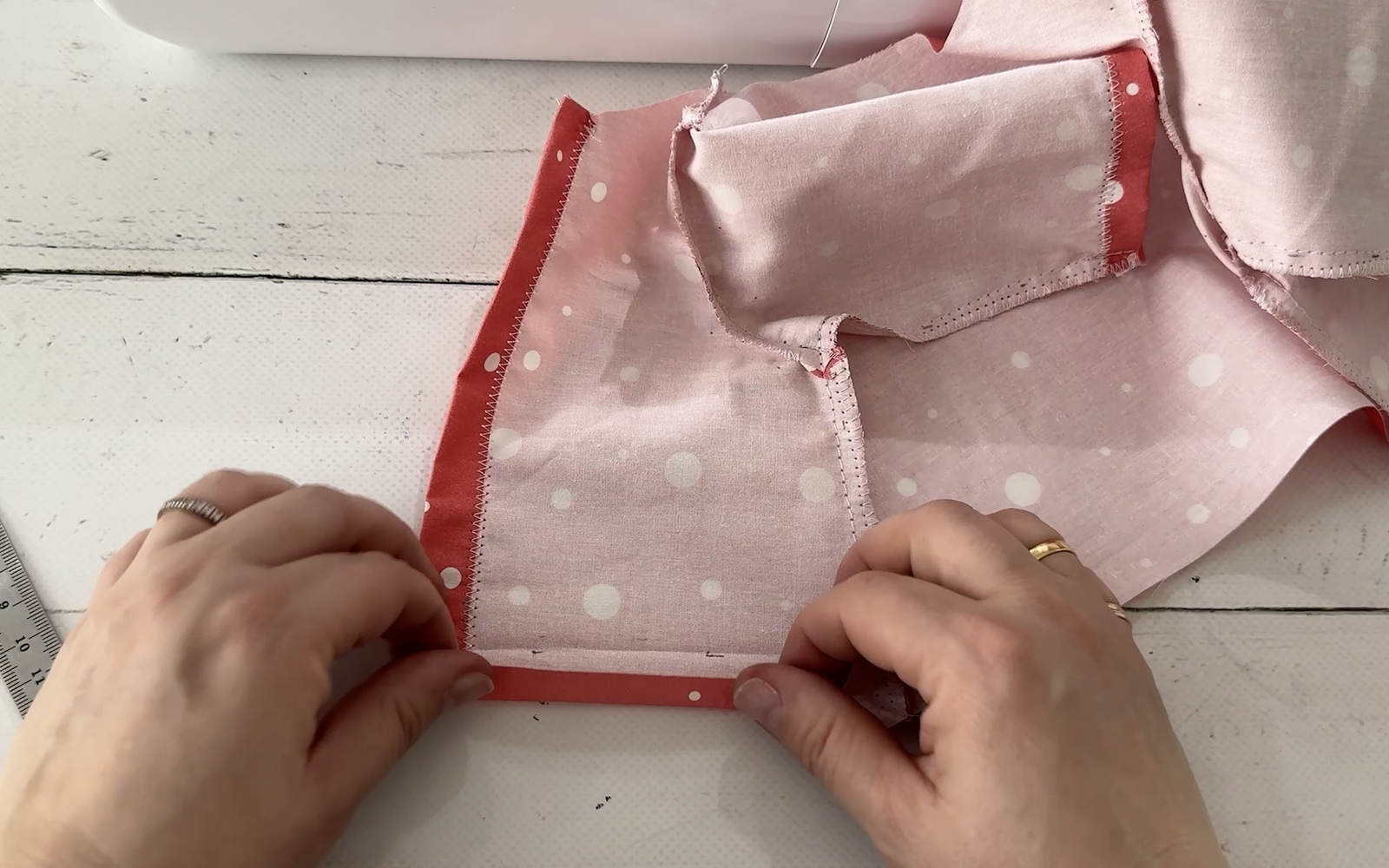 Folding a hem into a doll’s shirt