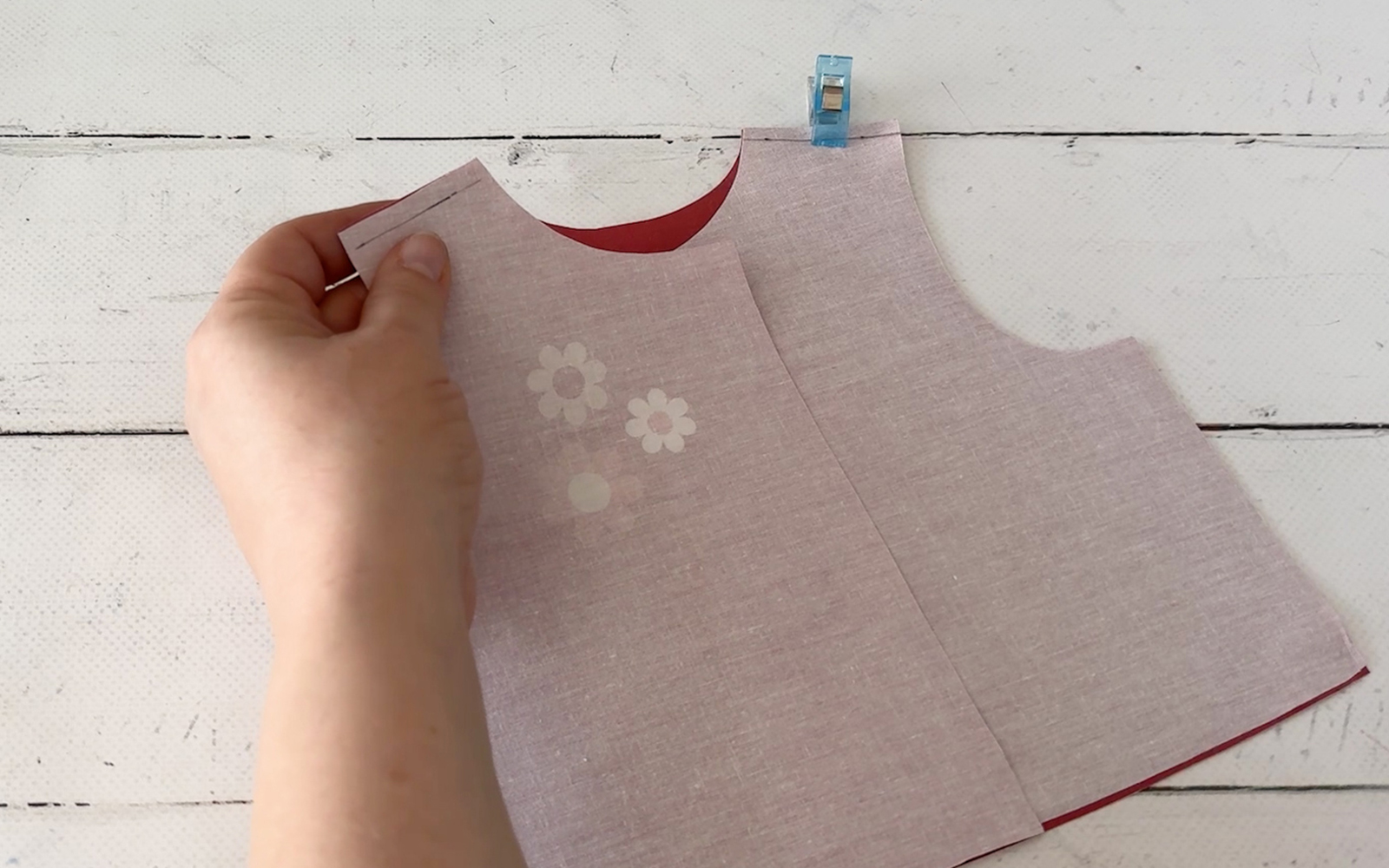 Pin and sew shoulder seams on doll’s jacket.