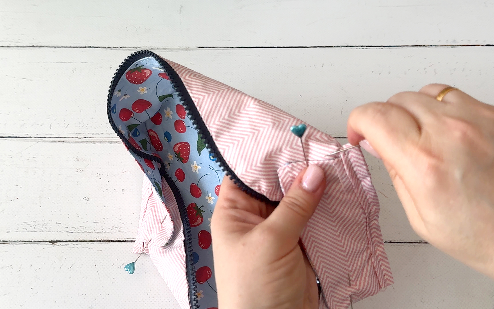 Secure the pencil case flap to the lining.