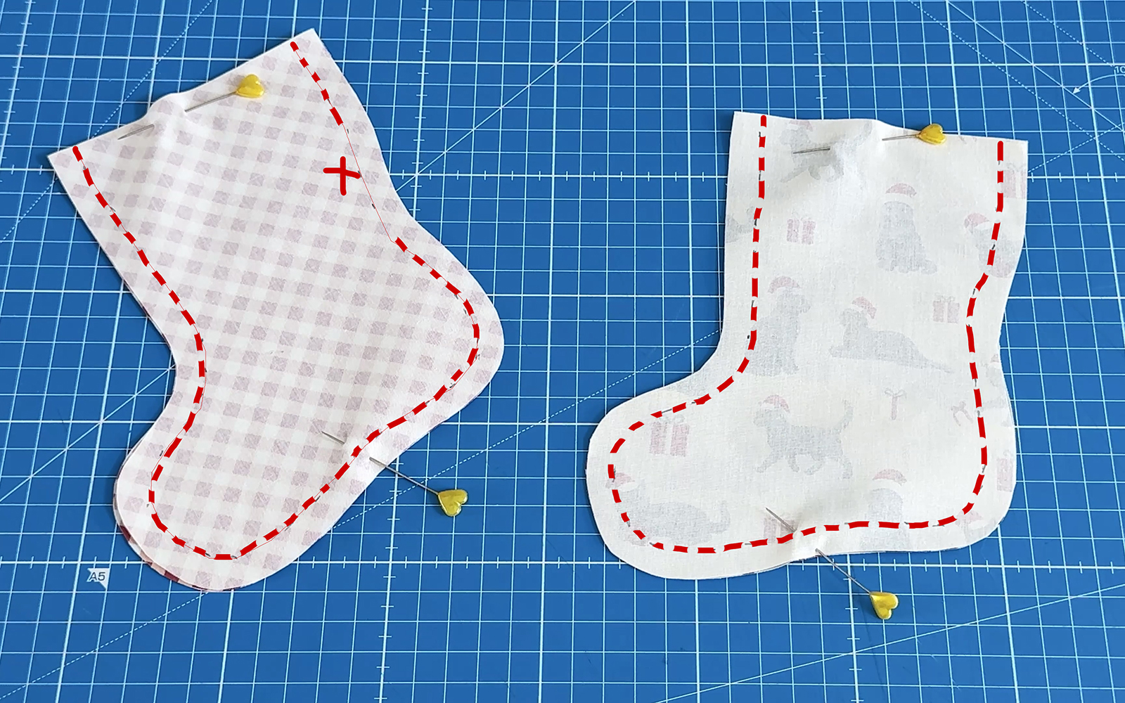 Printed fabric stockings with sewing instructions marked