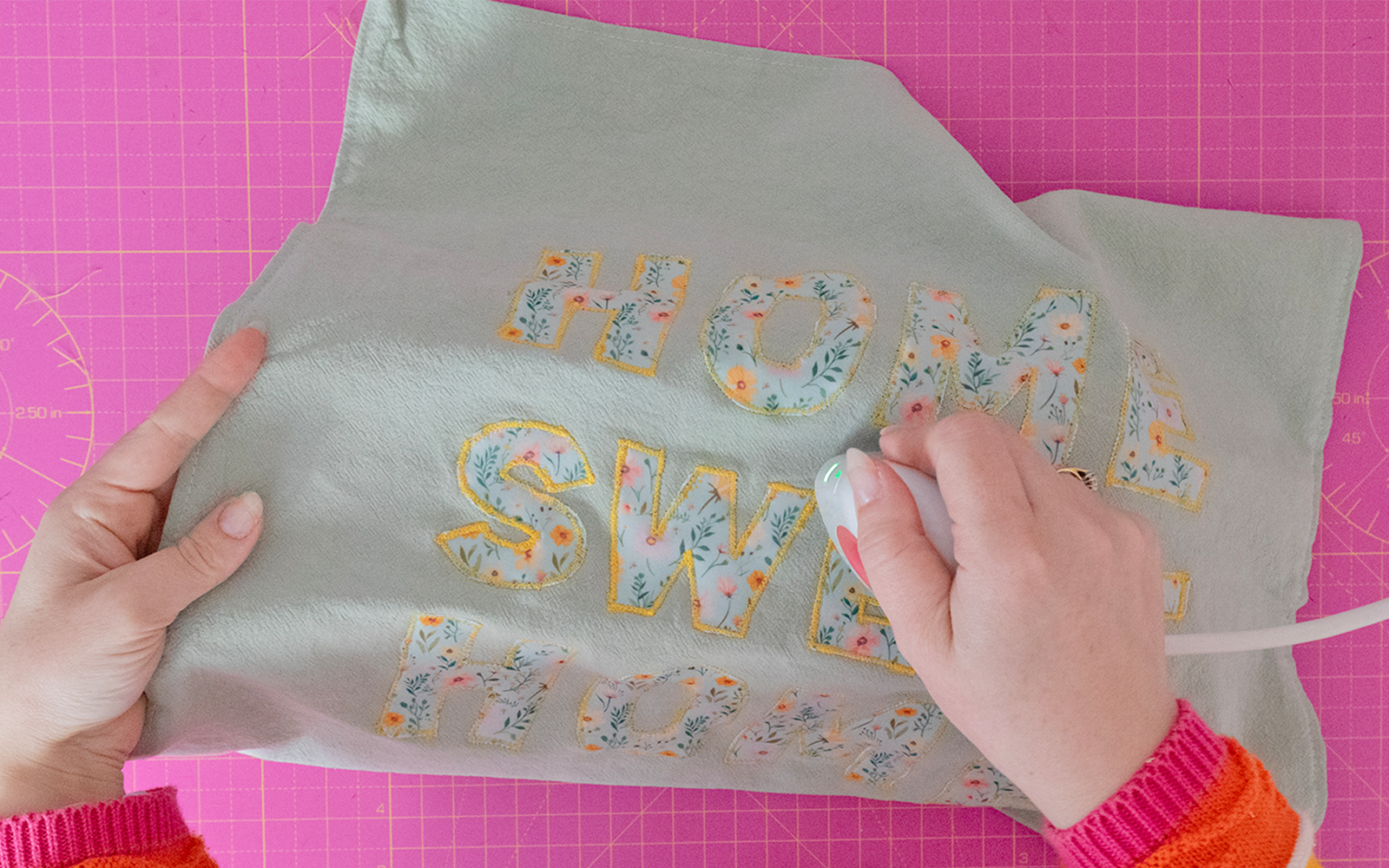 Pressing appliqué cushion cover with mini-iron