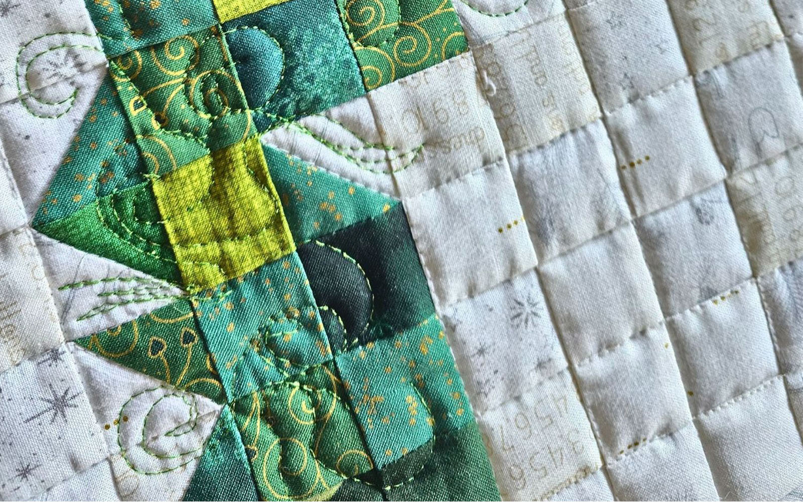 blue quilted jacket fabric with zip close up