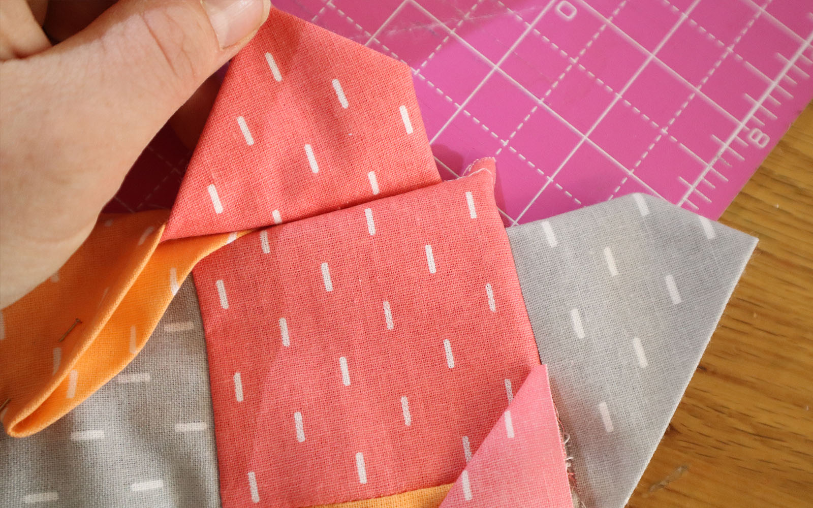 Triangle pieces folded open to show corner construction