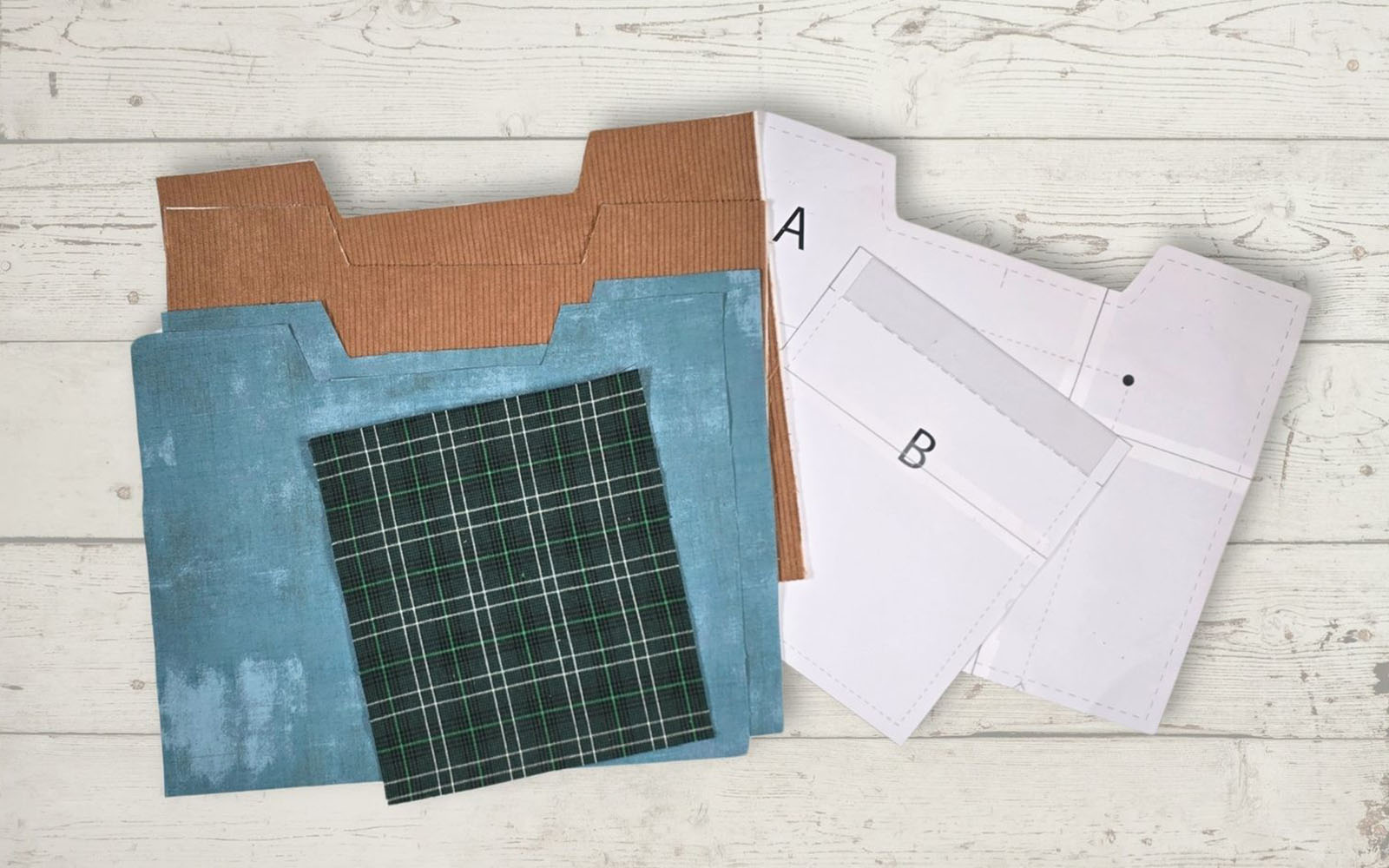 Cut fabric brown corduroy and tartan fabric to sew bag