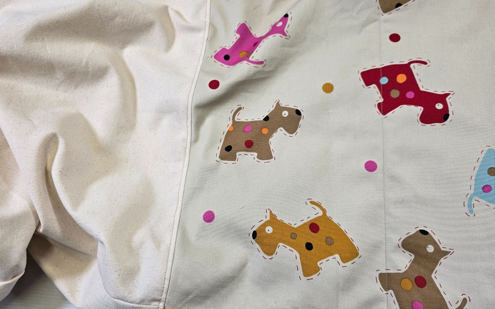 Cream fabric and fabric with dogs