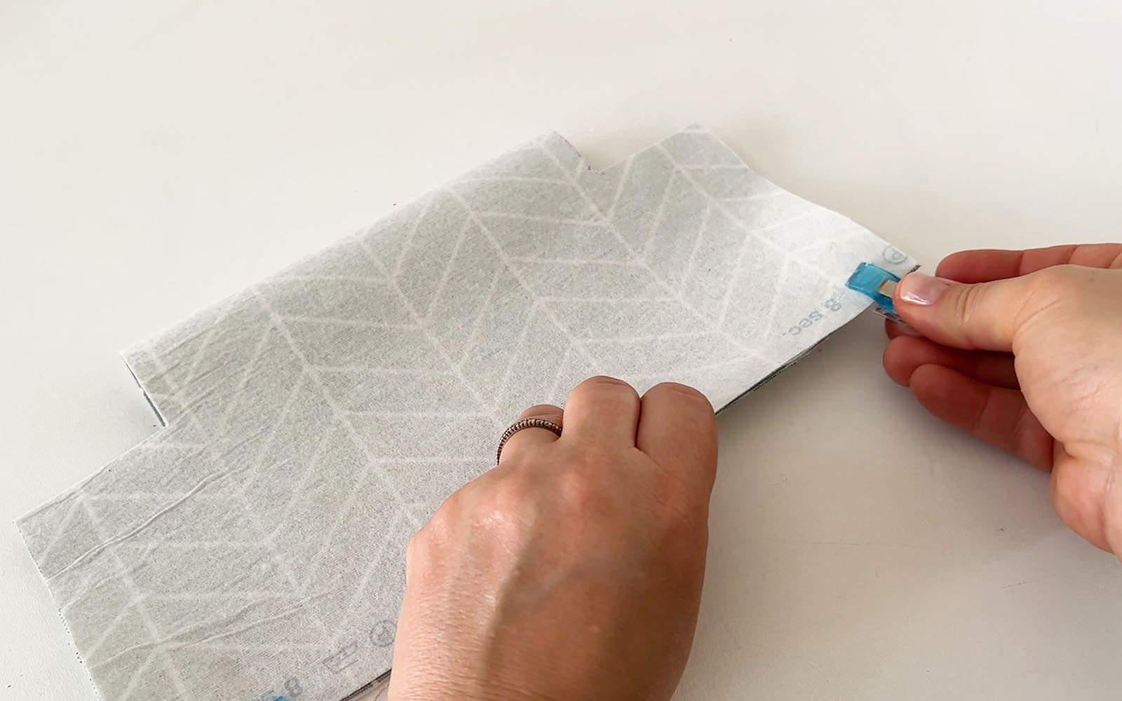 Fabric folded and secured with clip