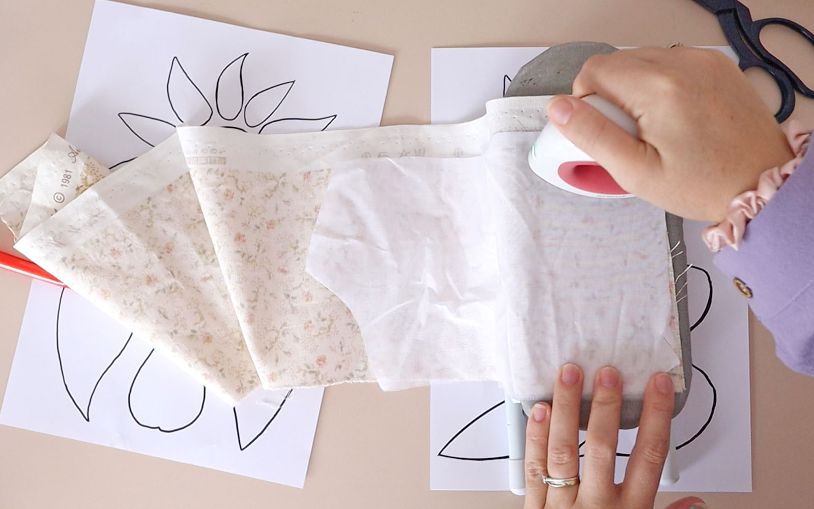 Small iron pressing interfacing to fabric