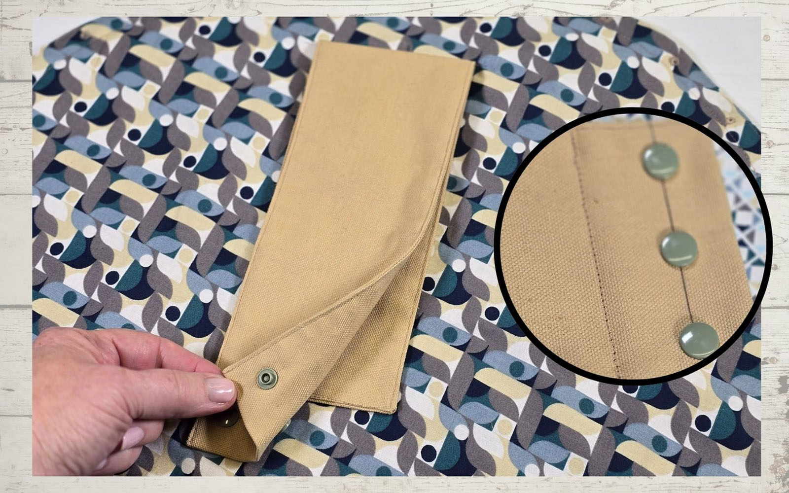 Bag strap being attached and sewn down