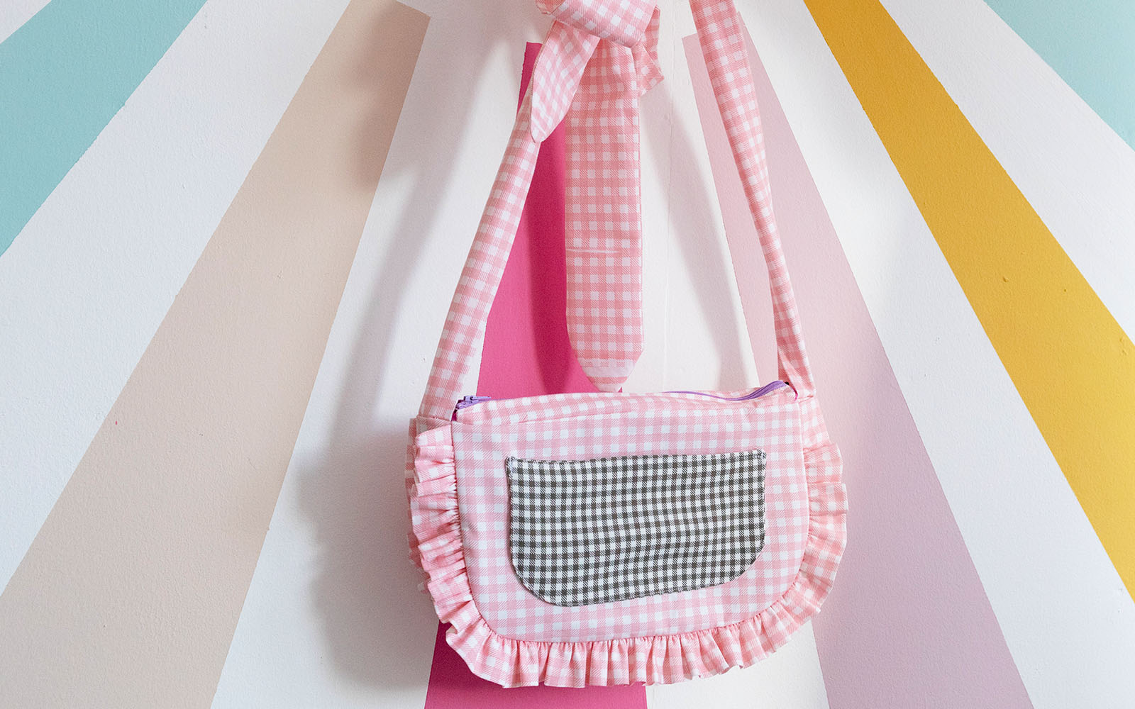 pink and black gingham bag with ruffle and bow detail