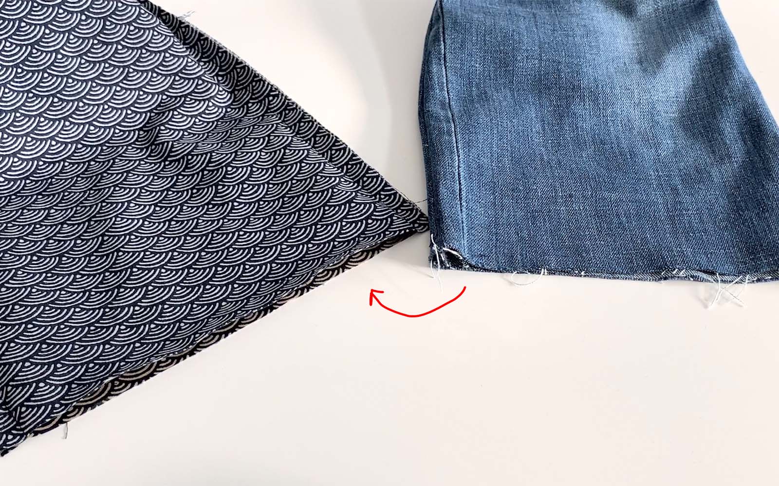 Small denim bag and lining side by side ready to sew