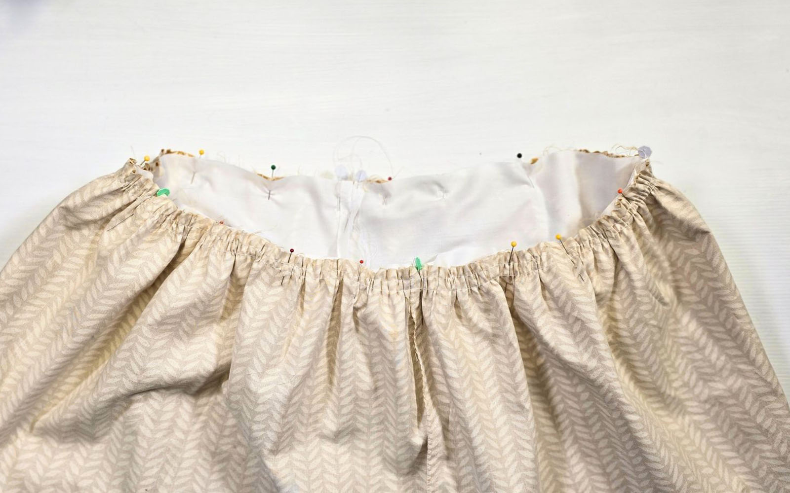 yellow gathered skirt pinner to white cotton lining