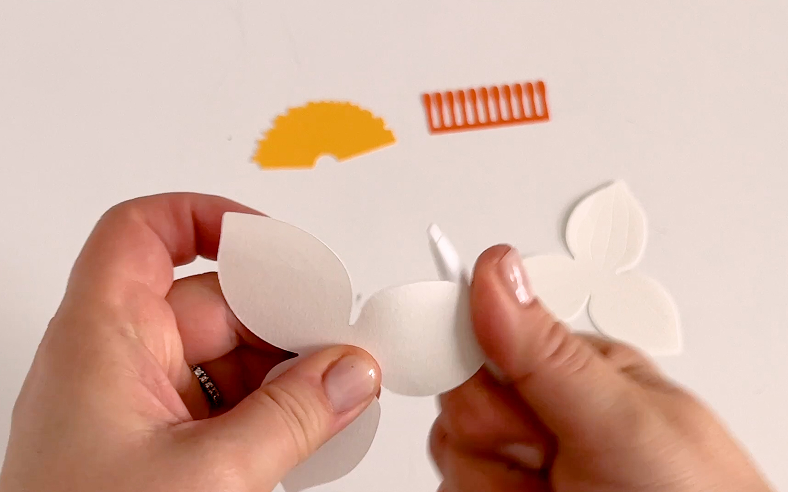 curling white paper petals using the ScanNCut pen