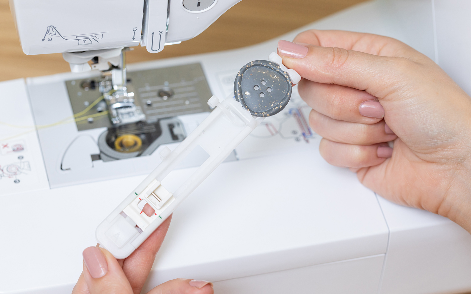 Grey button in Brother one-step buttonhole presser foot