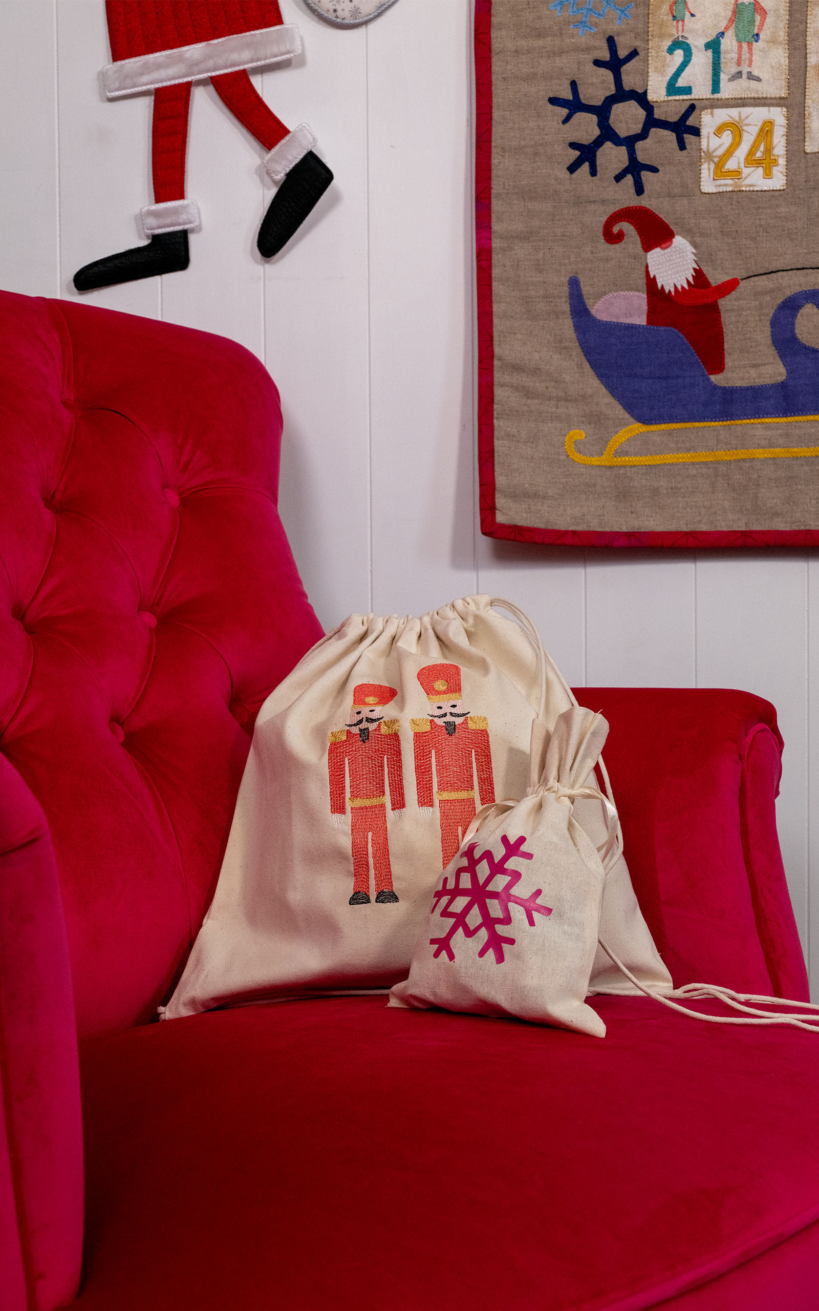Nutcracker and snowflake designs on reusable embellished wrapping bags