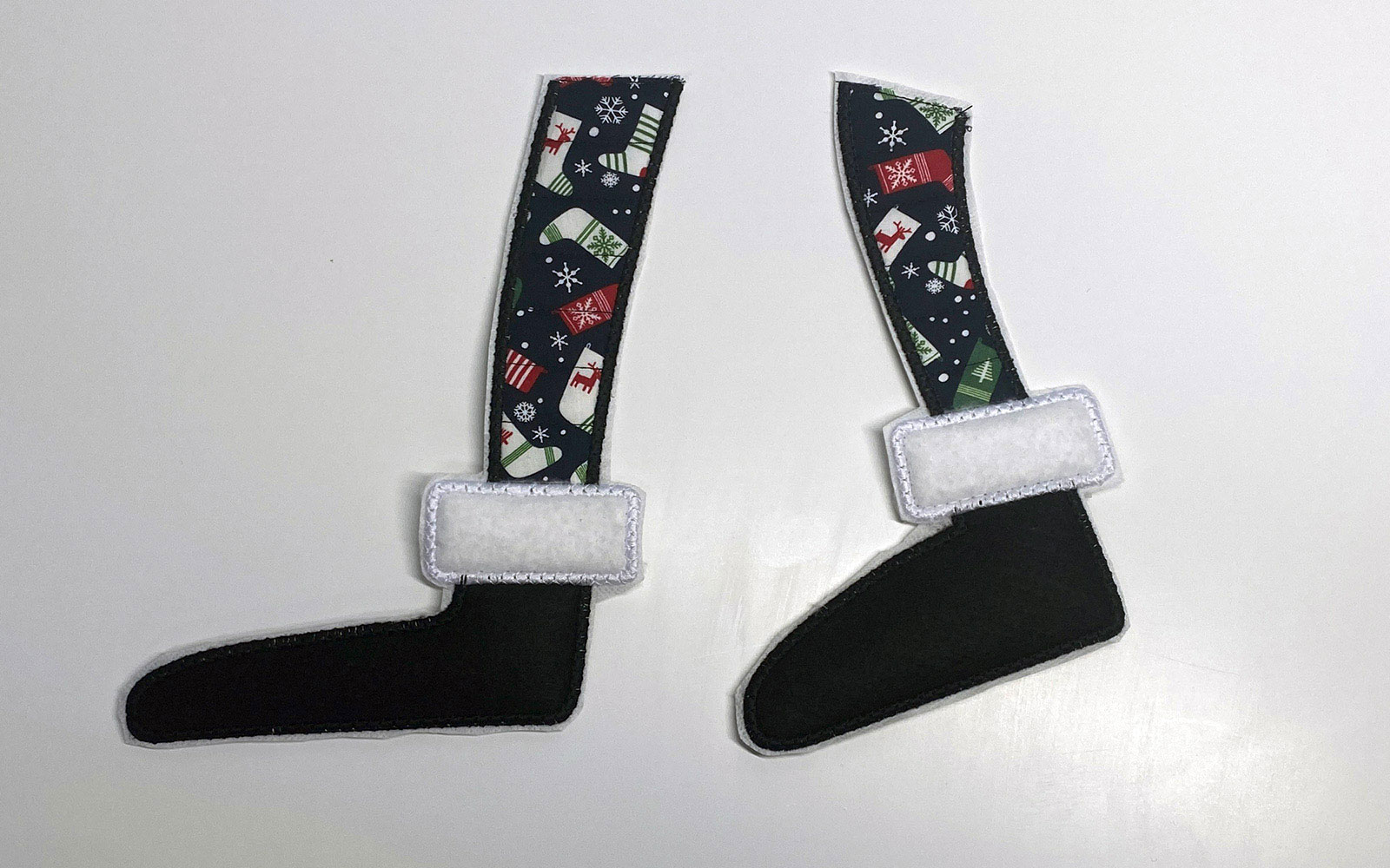 cut out fabric santa legs on white background