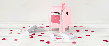pink mini mailbox on white background