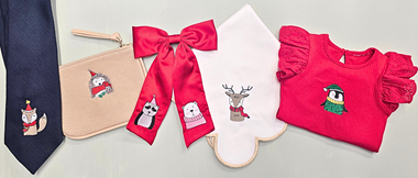 Sechs gestickte Tiermotive.