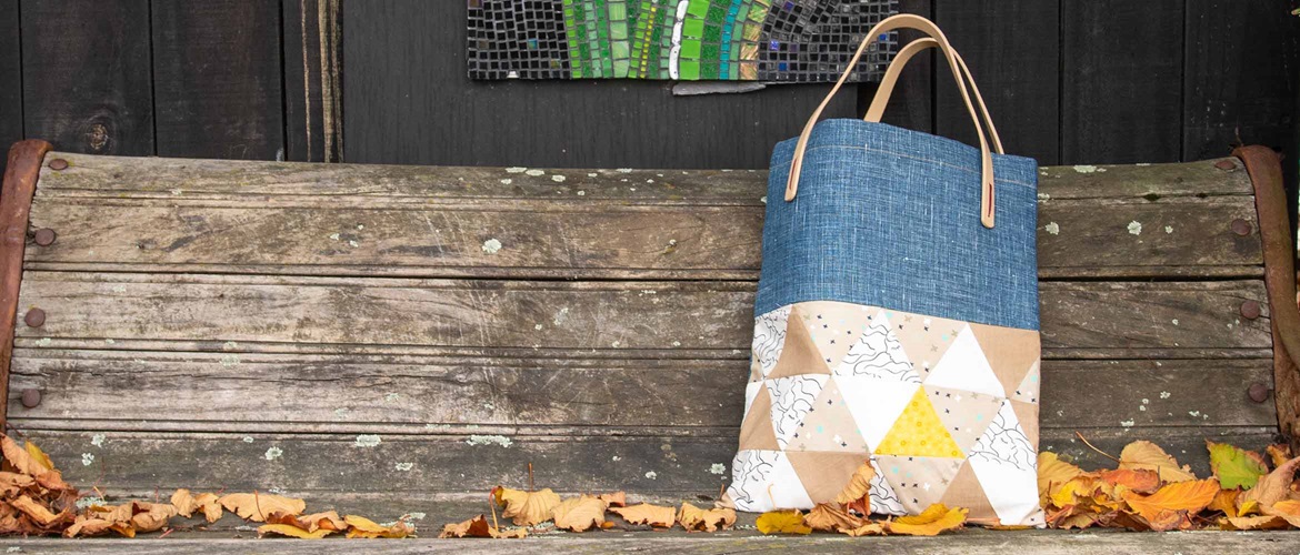 handbag with Triangle pattern on bench