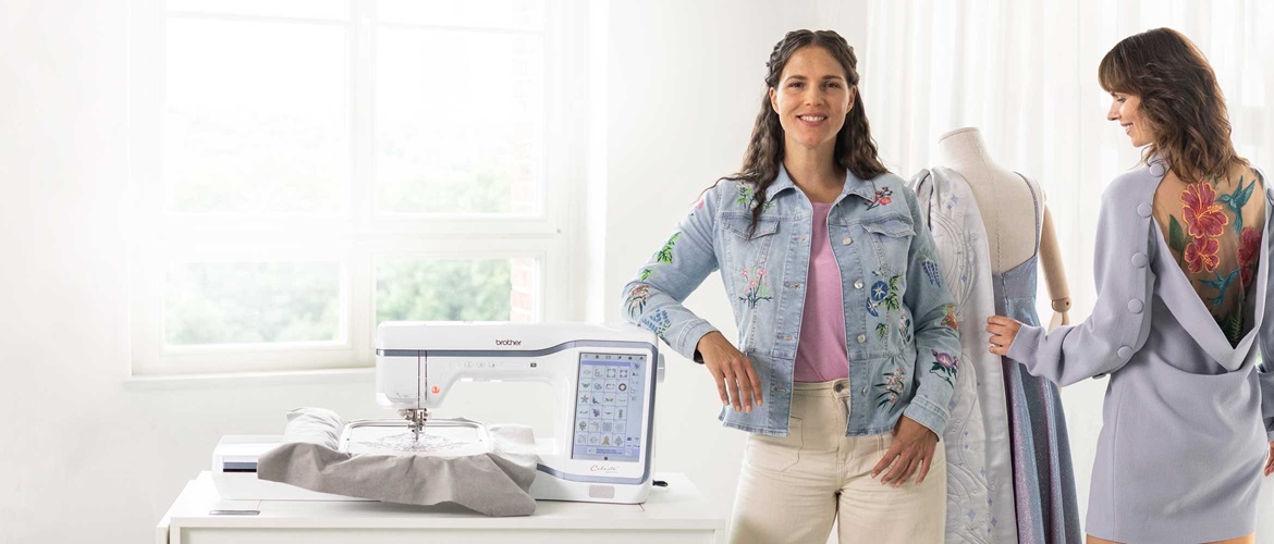Woman leaning on Celeste CX1e embroidery machine